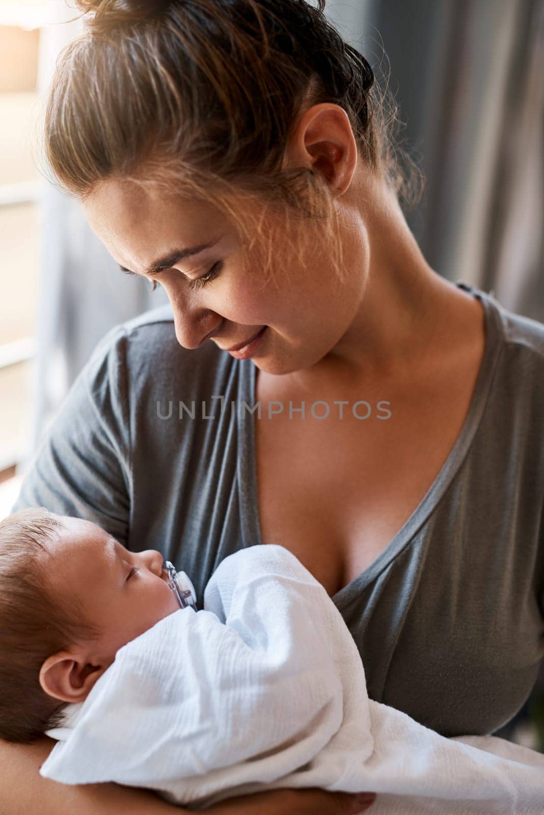 I could stare at him for hours. a young woman bonding with her baby boy at home