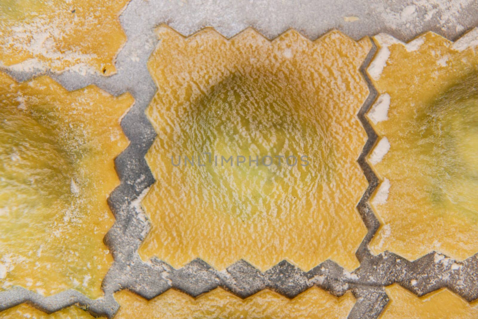 Recipe for Homemade Italian Ravioli pasta with Spinach and Ricotta Filling. High quality photo