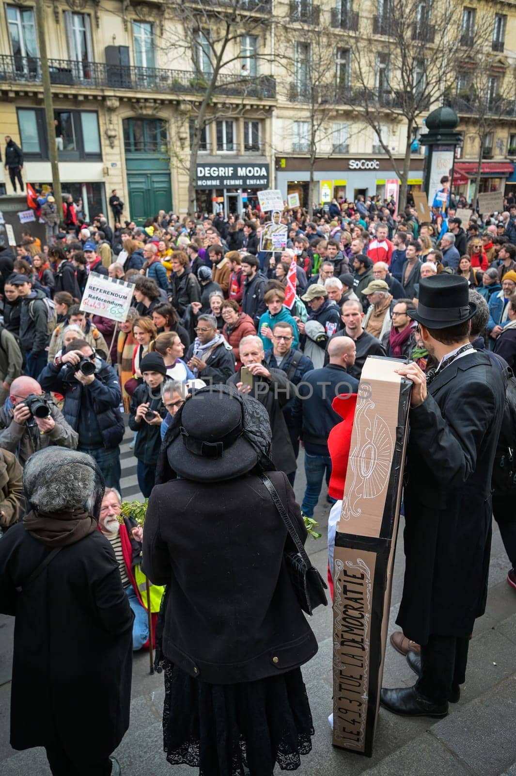 France, Paris, 2023-03-23. Demonstration, Strike, Ninth day of mobilisation against the pension reform. The Parisian procession, near Republique Place, High quality photo