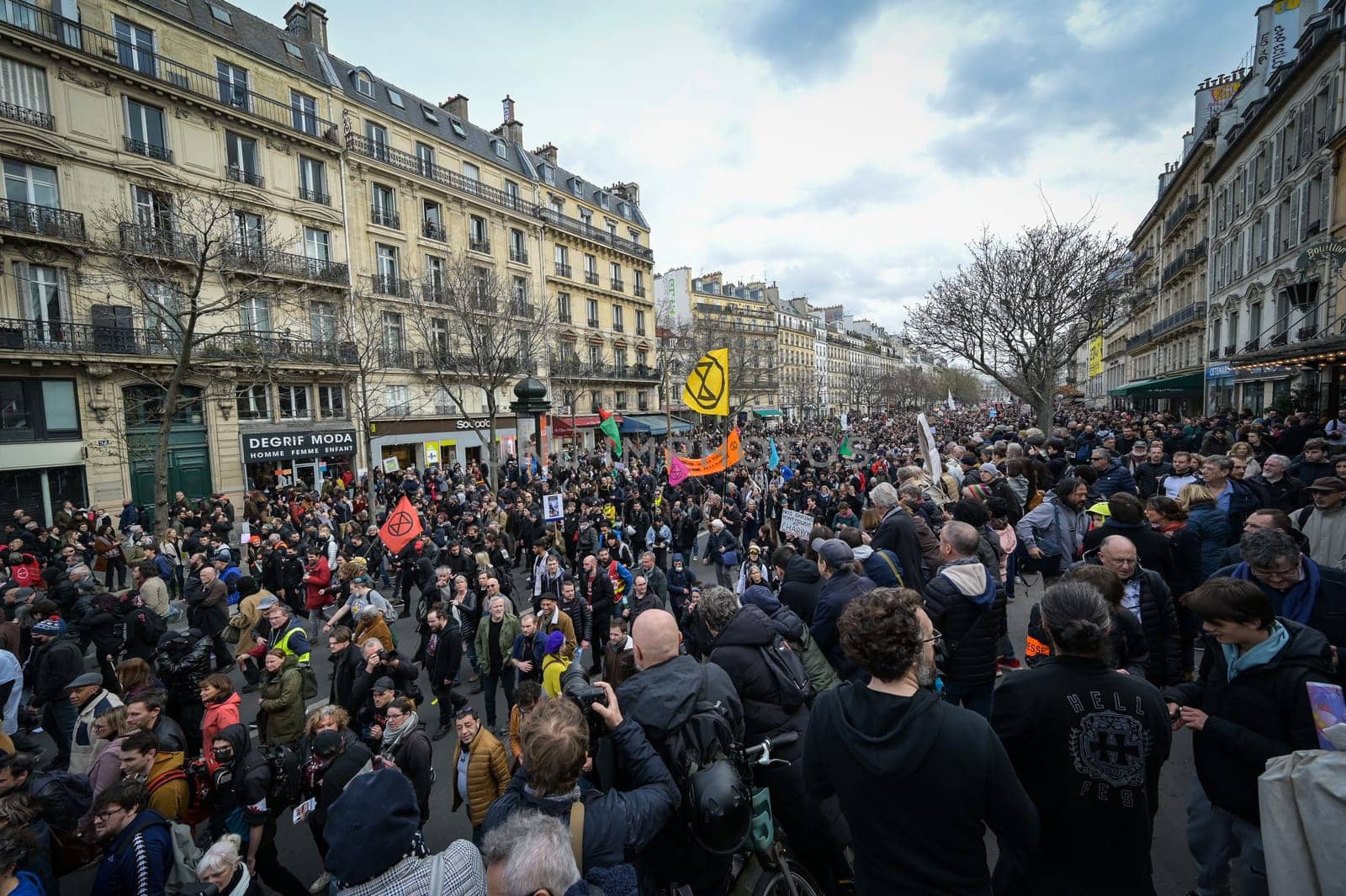 France, Paris, 2023-03-23. Demonstration, Strike, Ninth day of mobilisation against the pension reform. The Parisian procession, near Republique Place, High quality photo