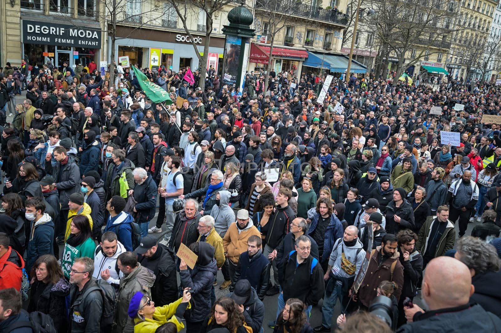 France, Paris, 2023-03-23. Demonstration, Strike, Ninth day of mobilisation against the pension reform. The Parisian procession, near Republique Place, High quality photo