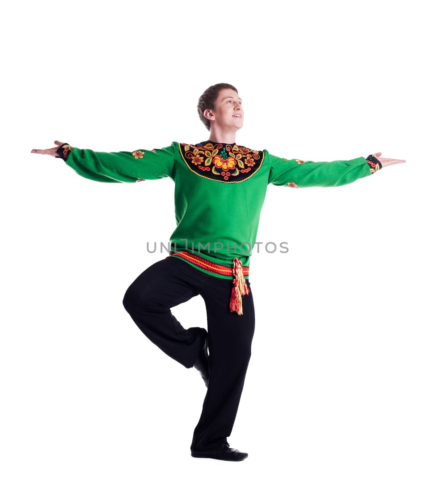 Image of smiling folk dancer posing in studio, isolated on white