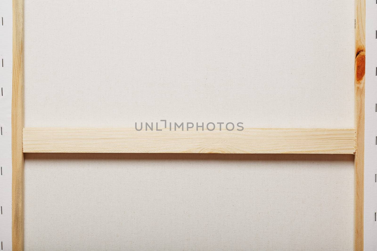 Canvas for artists stretched on a wooden rail, as a background by AlexGrec