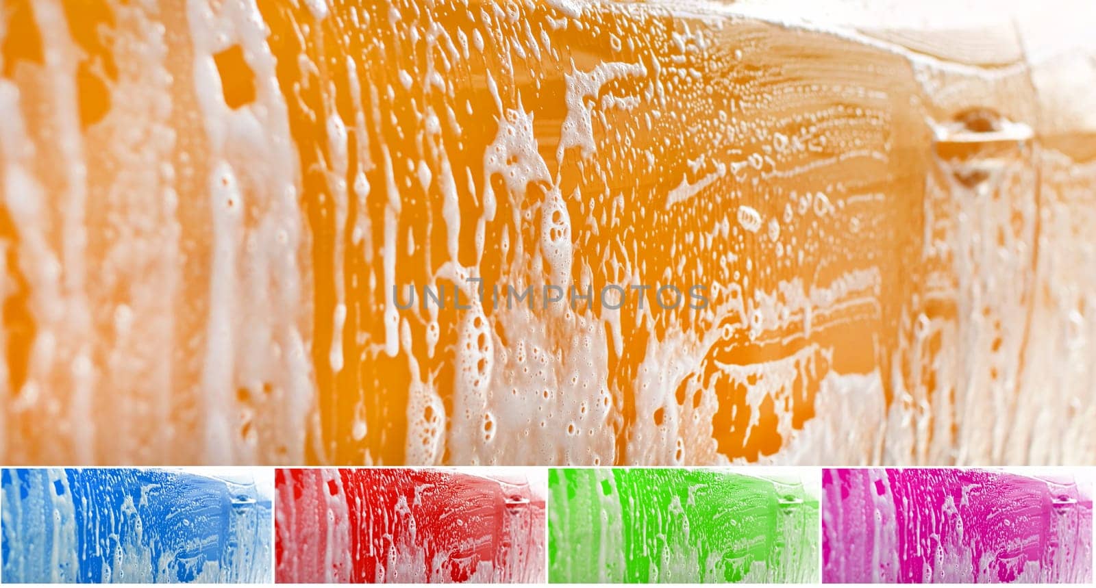 Side of yellow car washed, shampoo and foam on yellow surface. Color can be easily changed with hue shift in photo editor. Abstract car wash background.