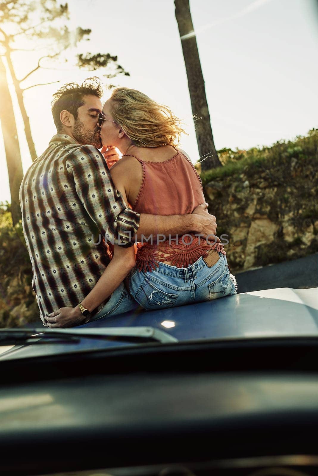 Life is for deep kisses and great adventures. an affectionate couple spending the day outdoors