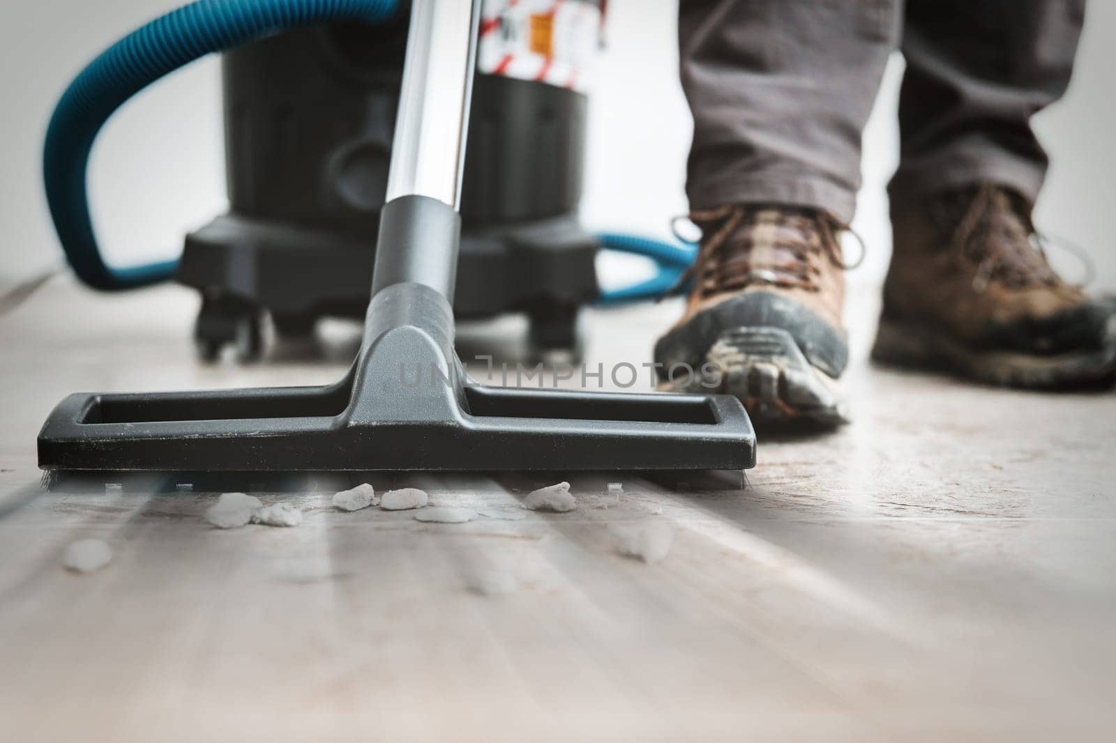 Industrial powerful vacuum cleaner, construction cleaning service.