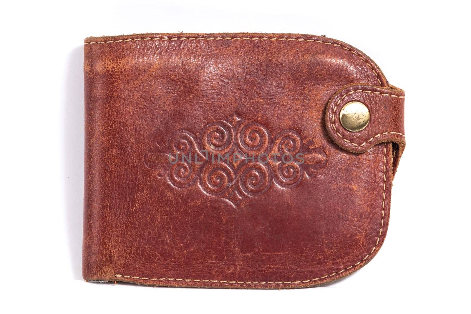 Brown leather wallet with Kazakh national embossed ornament on a white background.