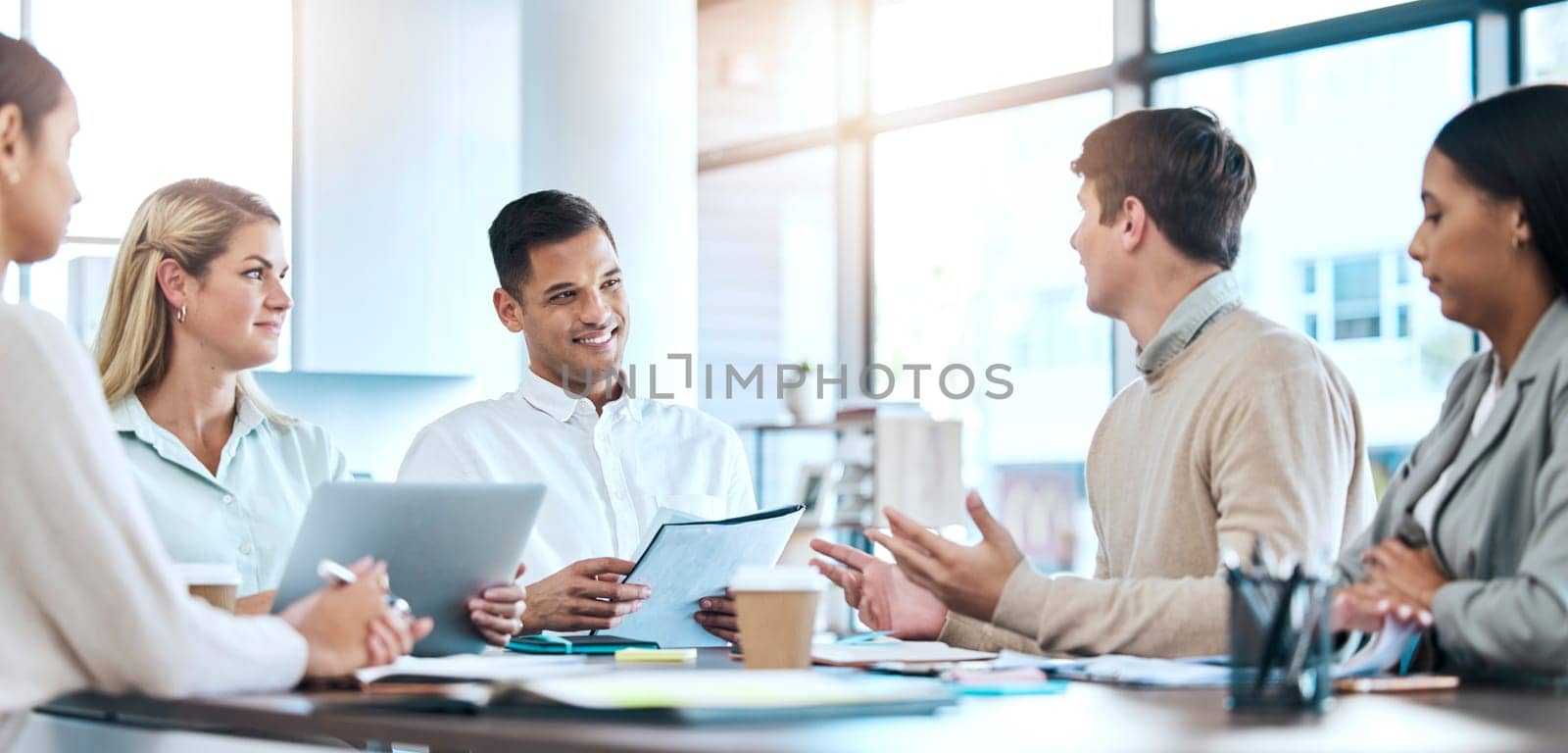 Business meeting, planning and people teamwork, discussion and workflow agenda in conference room. Professional employees, staff or happy group with documents in seminar, workshop or office company by YuriArcurs