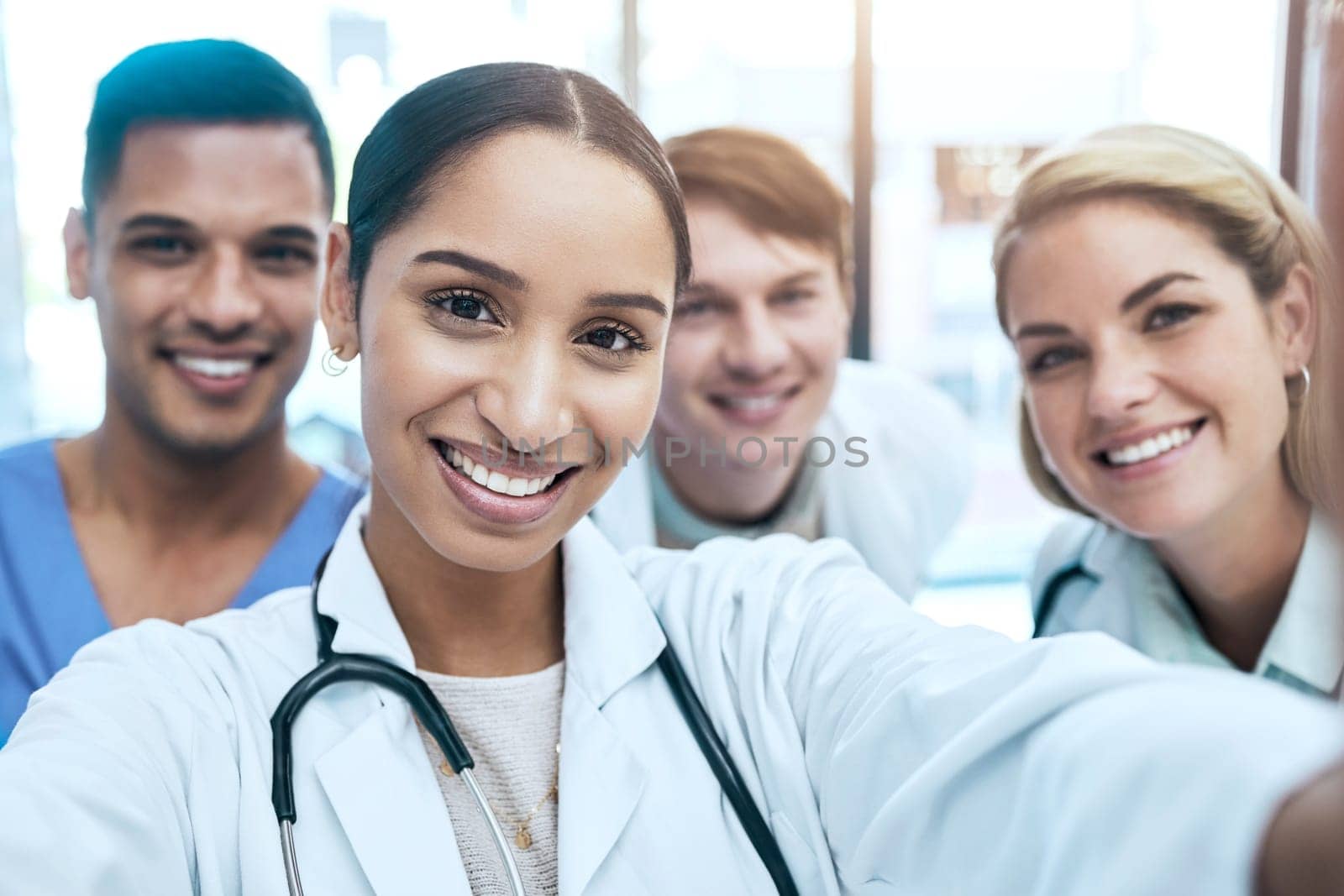 Portrait selfie of doctors, nurses or healthcare group of people for social media or medical teamwork. Face of diversity women and internship people smile in profile picture for career post or memory by YuriArcurs