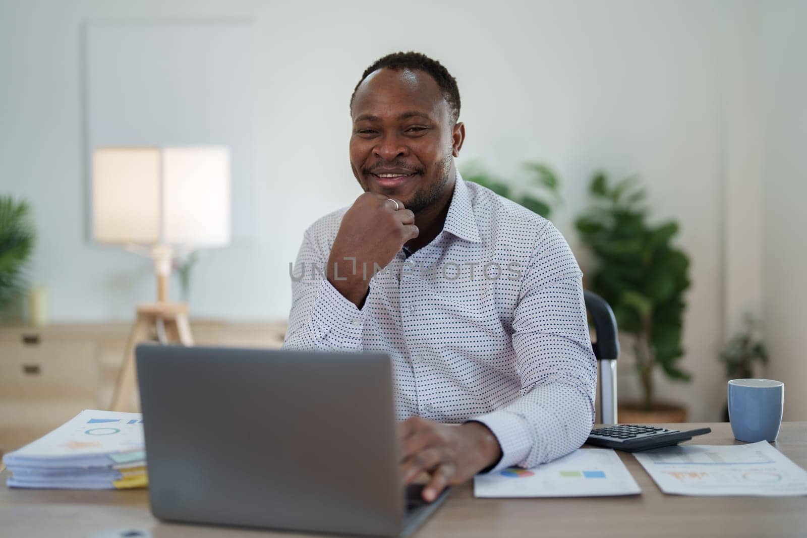 Beautiful young teen American African business women holding computer laptop with hands up in winner is gesture, Happy to be successful celebrating achievement success.