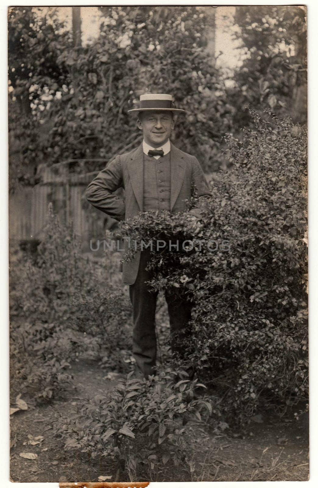 RIO DE JANEIRO, BRAZIL - OCTOBER 31, 1912: Vintage photo shows man wears straw boater hat. Retro black and white photography.