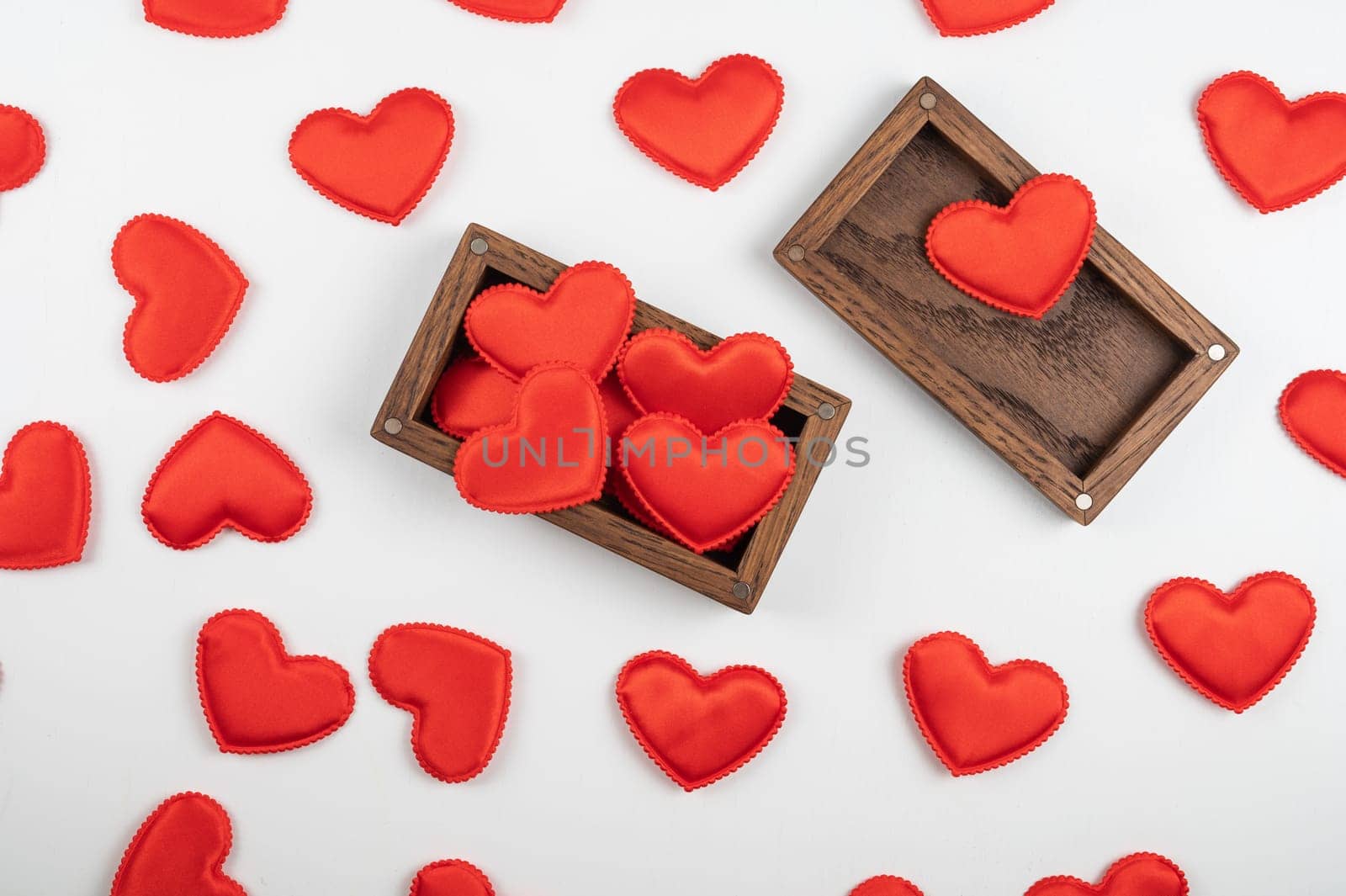 Valentine day white wood background with gift box with red hearts. Valentines day or love concept, copy space