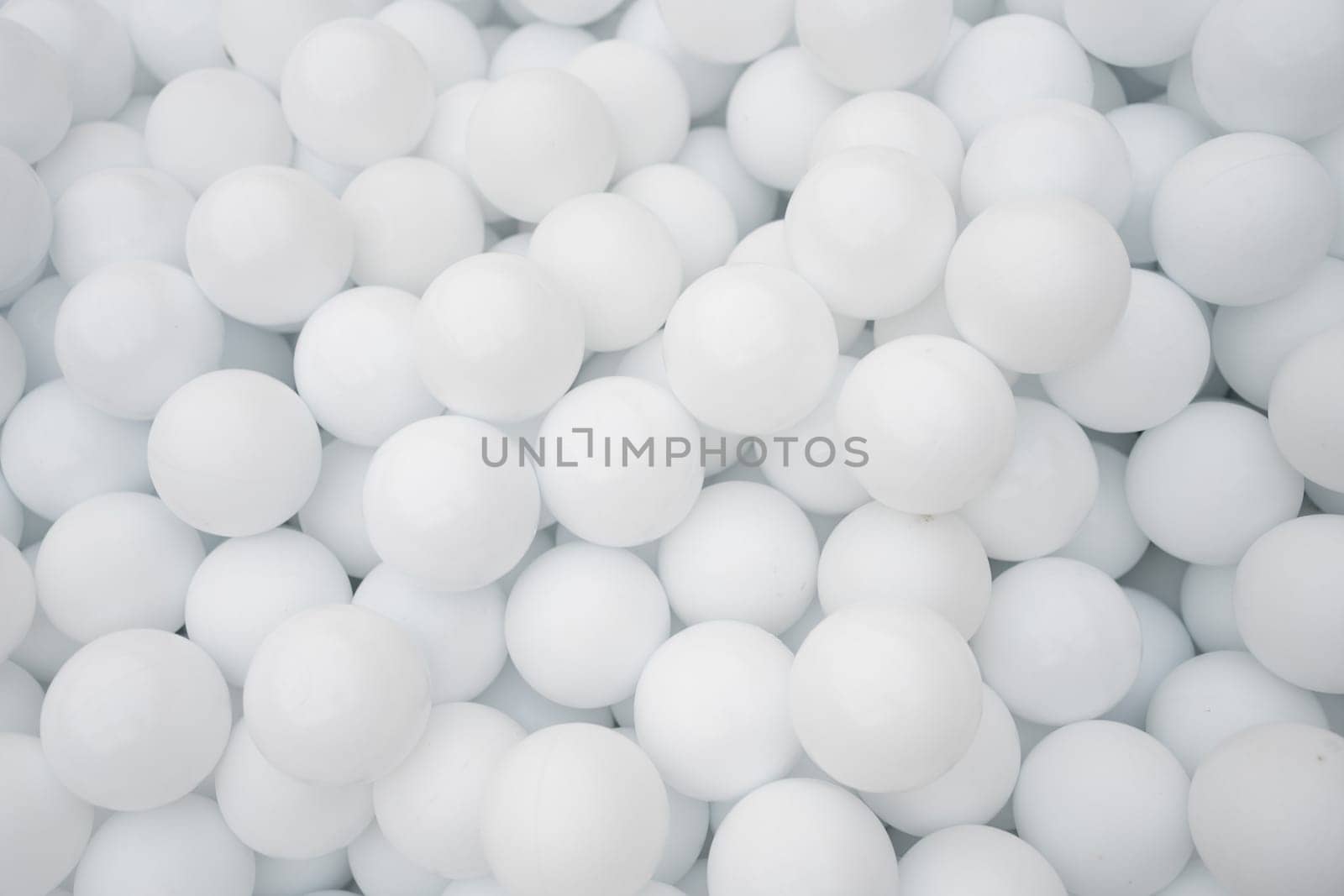 Many white plastic balls for dry pool. by andreonegin