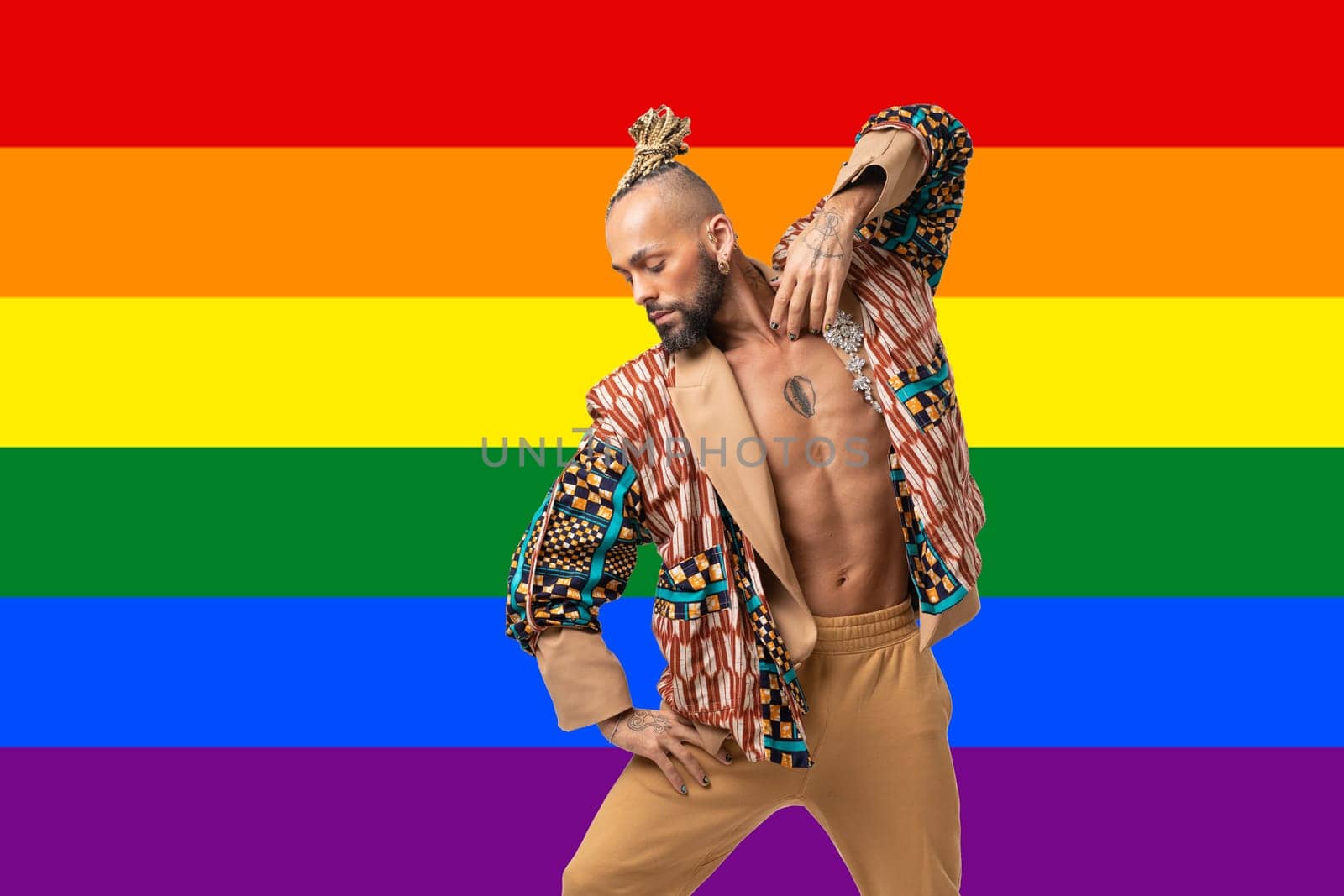 Portrait Trendy black latin gay man in fashionable clothes dancing isolated LGBT rainbow colors background studio portrait People fashion lgbtq concept.