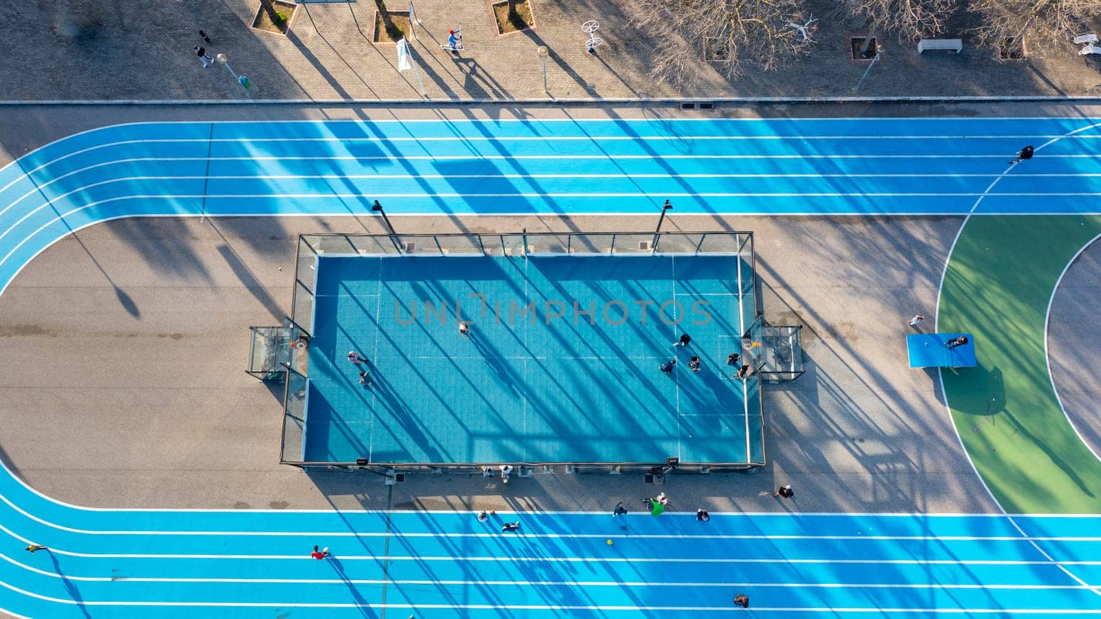 Field for training. Field for various sports. Running track. Basketball and soccer court. Aerial view