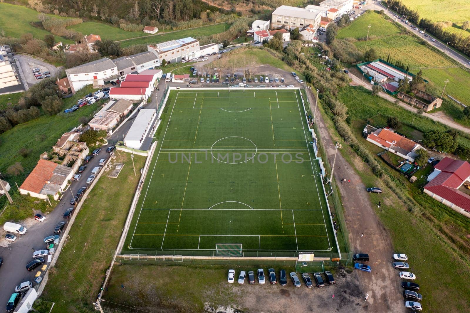 Football field aerial view, public soccer court for training and competition in city.