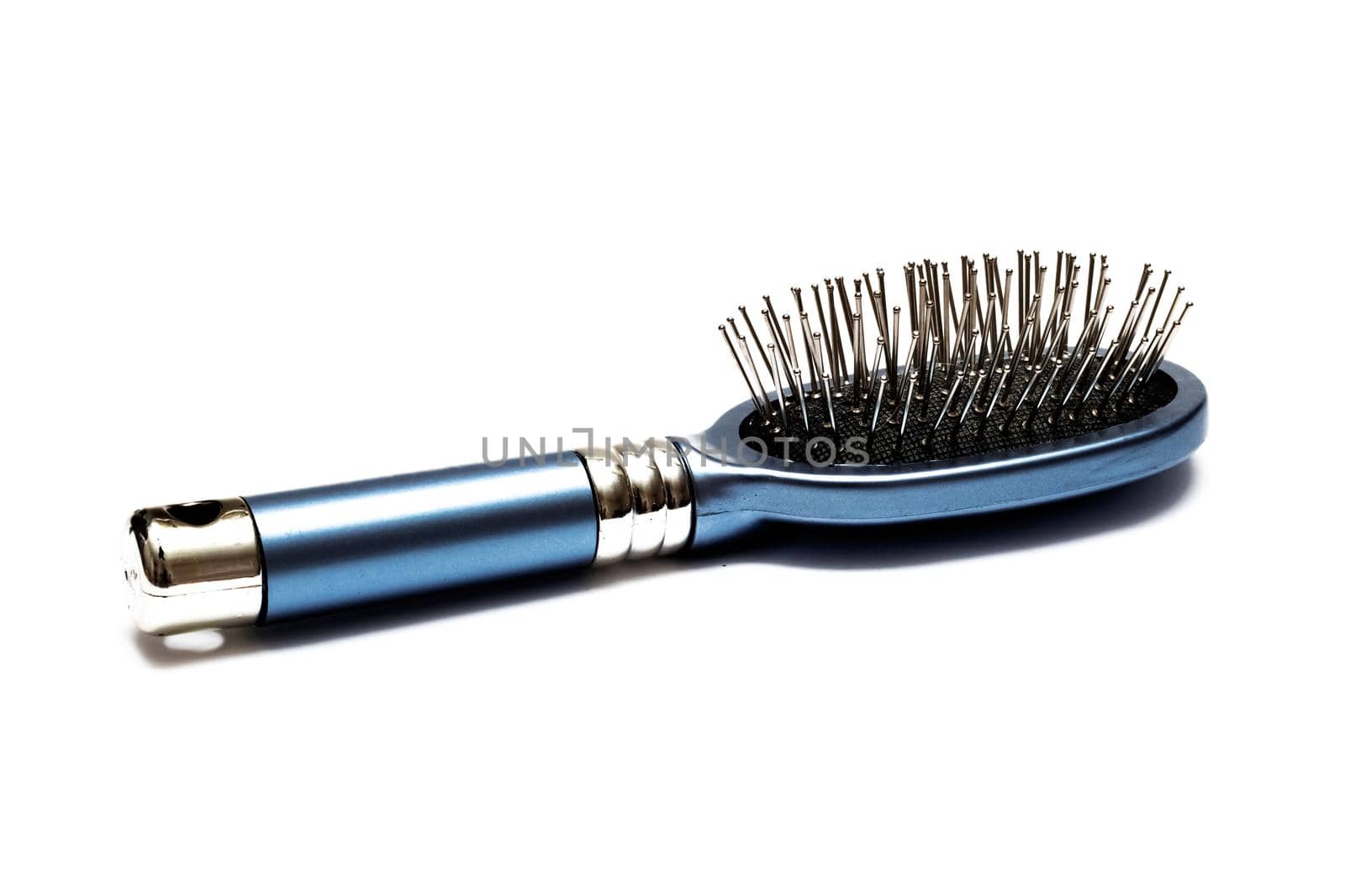 Blue metal hairbrush isolated on white background by Vera1703