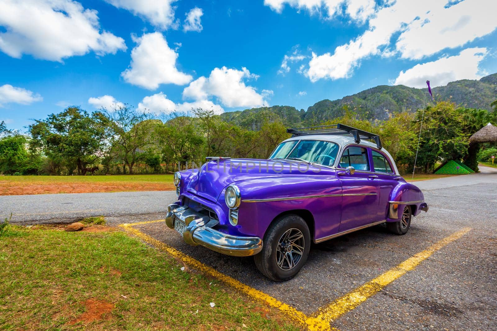 Classic American car in scenic Cuba