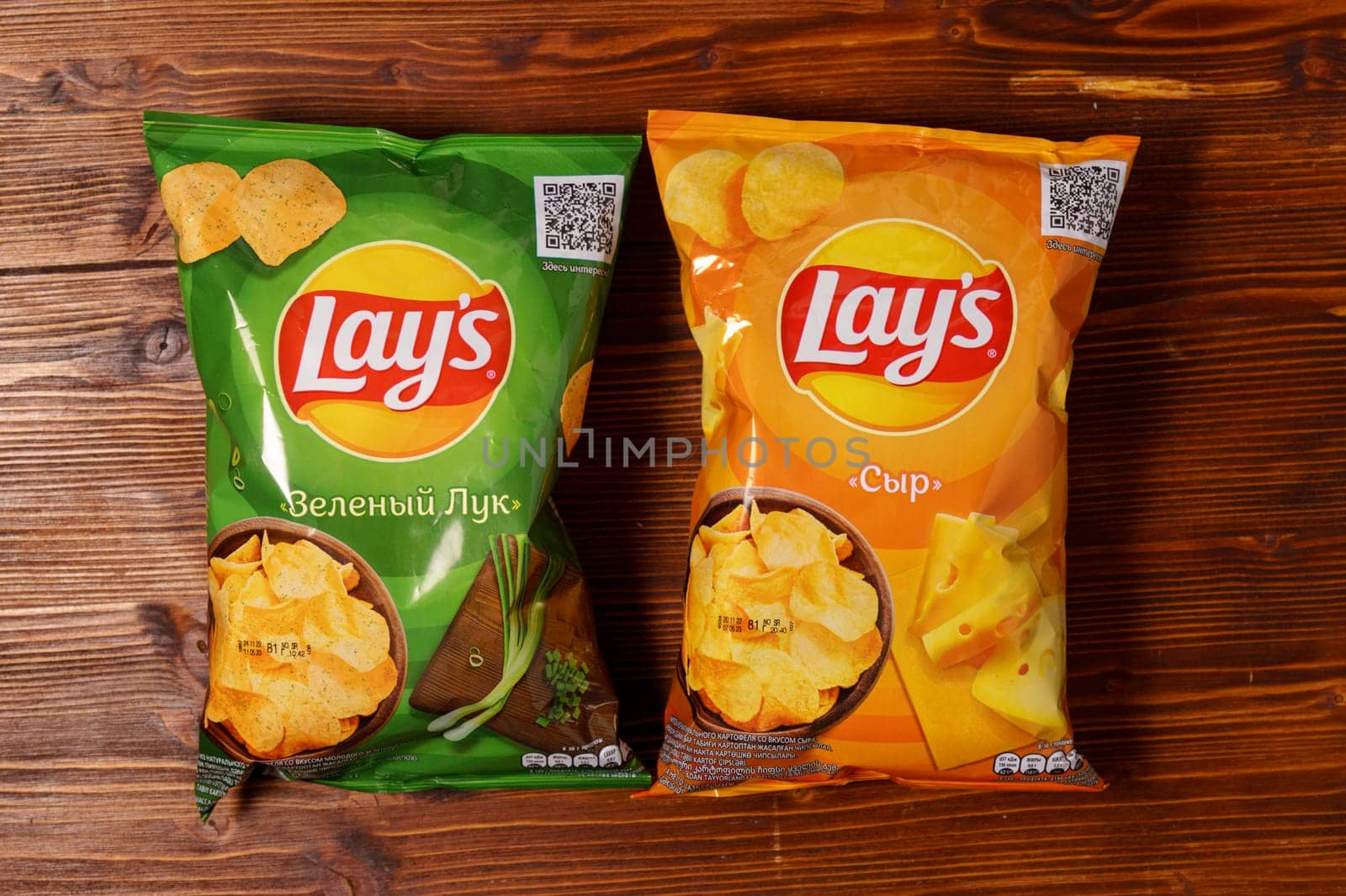Tyumen, Russia-January 06, 2023: Lays a popular brand of potato chips. Lays has been owned by PepsiCo through Frito Lay since 1965.