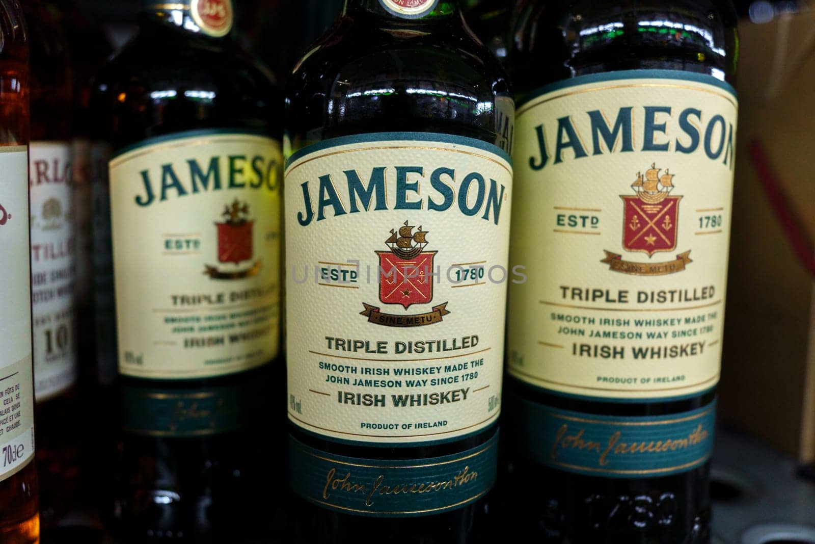 Tyumen, Russia-March 17, 2023: Jameson Irish Whiskey, blender on hypermarket shelves
