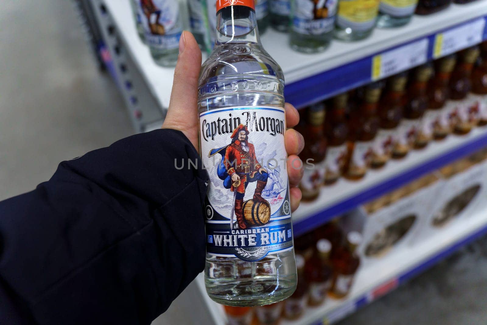 Tyumen, Russia-March 17, 2023: Original bottle for Captain Morgan white rum drink.