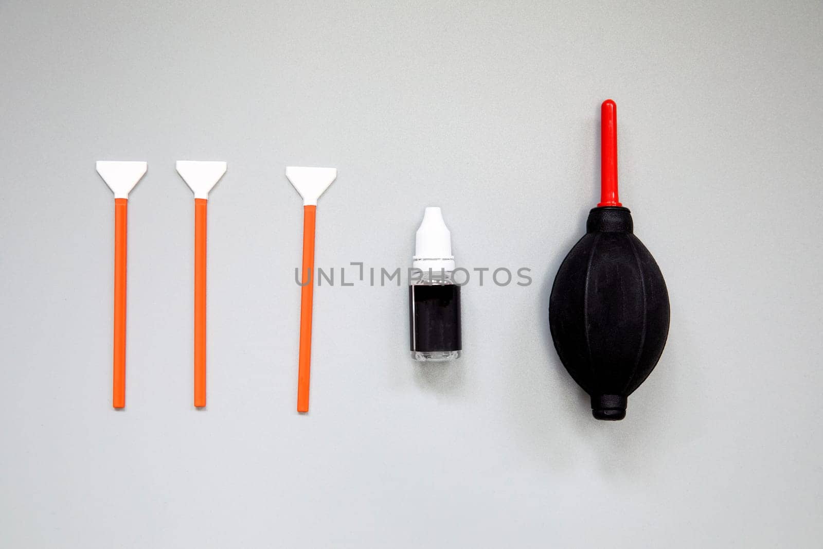 Sensor cleaning kit, Layout of cleaning kit for digital cameras, cleaning sensor with small brush and airbomb. Copy space for text in the middle top view