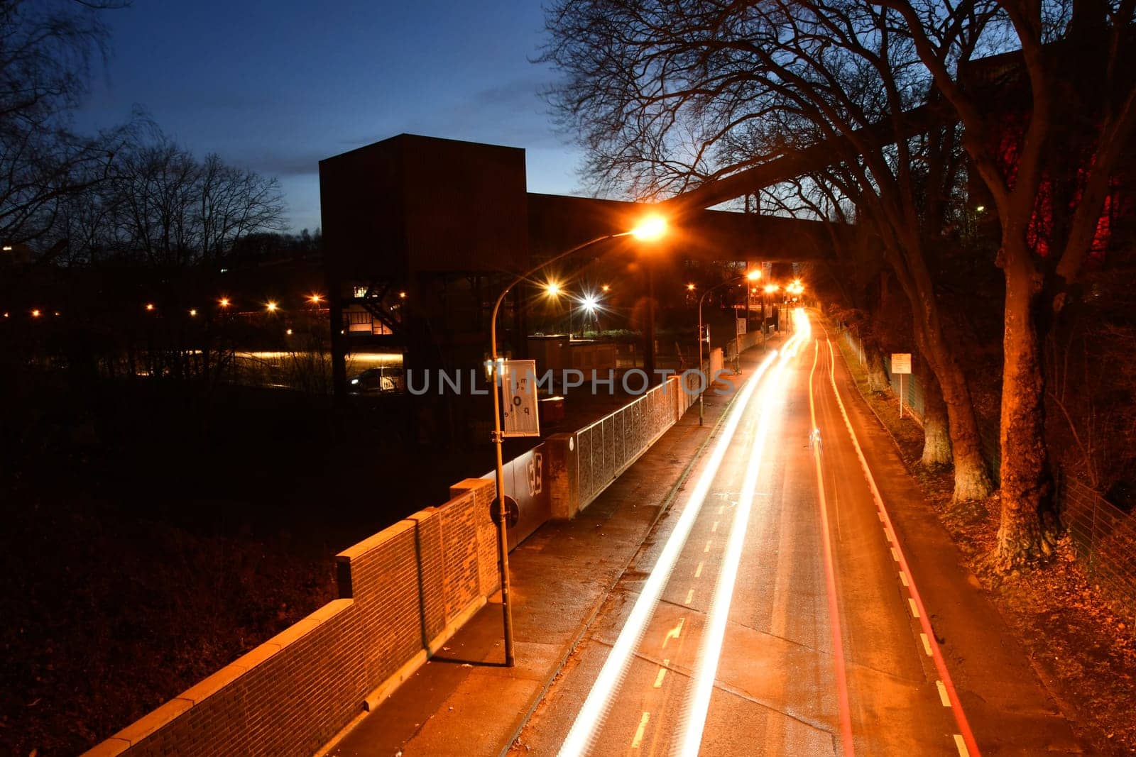 High angle of neon traffic lights on the street shot in long exposure in Essen, Germany