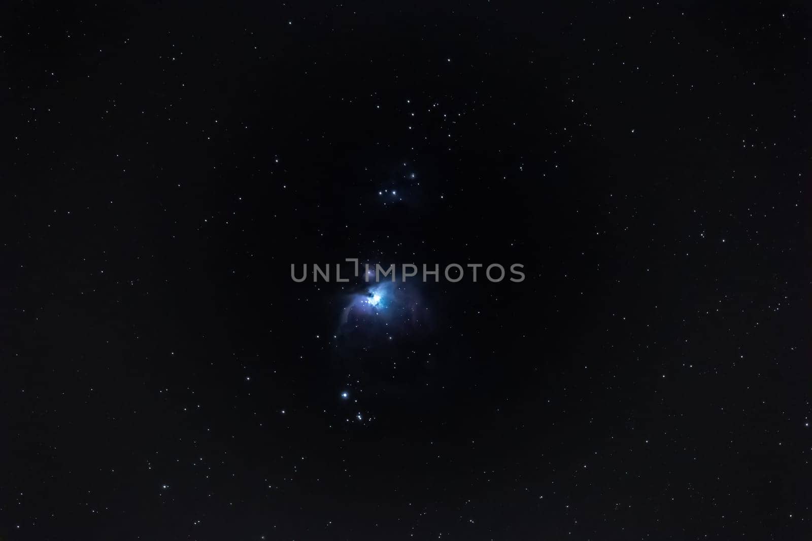 Astrophotography of the emission nebula Orion Nebula M42 with 500mm at 20 seconds exposure in the night sky near Darmstadt, Germany on February 12, 2023 at 10 p.m