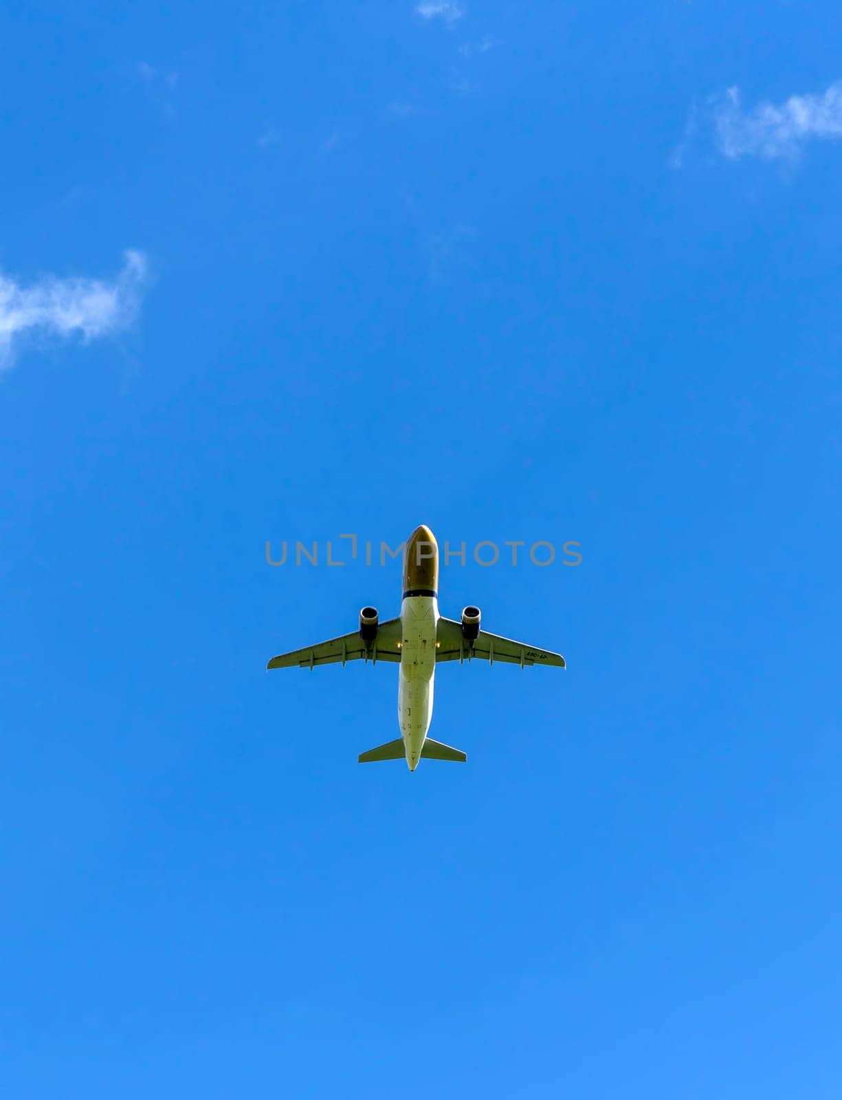 MOSCOW , RUSSIA, June 10, 2019: The Commercial passenger airplane flying overhead on sunny day on June 10, 2019 in Moscow, Russia.