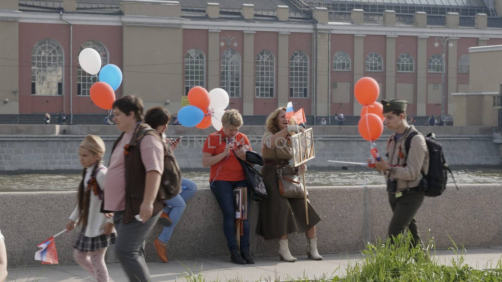 MOSCOW, RUSSIA , May 09, 2019: Over one million people of all ages take part in the Immortal Regiment parade celebrating the memory of loved ones fallen in WWII after the state Victory Parade.