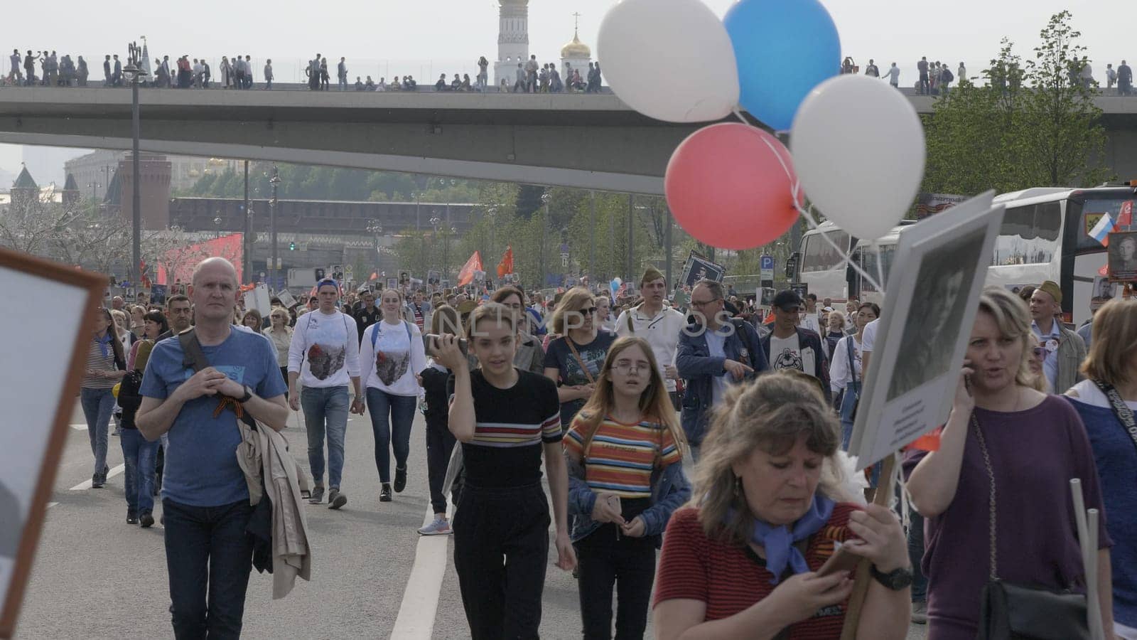 MOSCOW, RUSSIA , May 09, 2019: Over one million people of all ages take part in the Immortal Regiment parade celebrating the memory of loved ones fallen in WWII after the state Victory Parade.