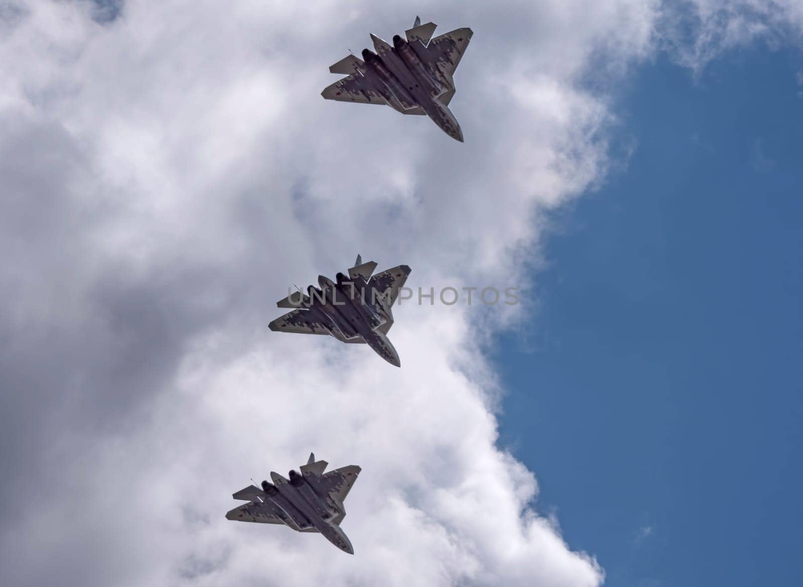 MOSCOW, RUSSIA - MAY 7, 2021: Avia parade in Moscow. Sukhoi Su-57 in the sky on parade of Victory in World War II in Moscow, Russia