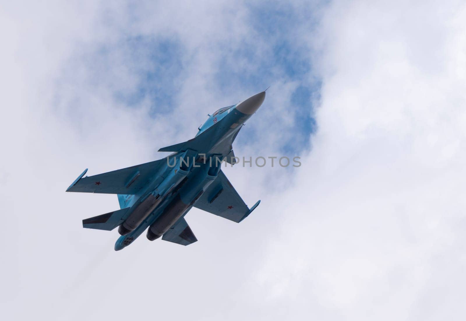 MOSCOW, RUSSIA - MAY 7, 2021: Avia parade in Moscow. jet fighter aircraft Su-30 in the sky on parade of Victory in World War II in Moscow, Russia