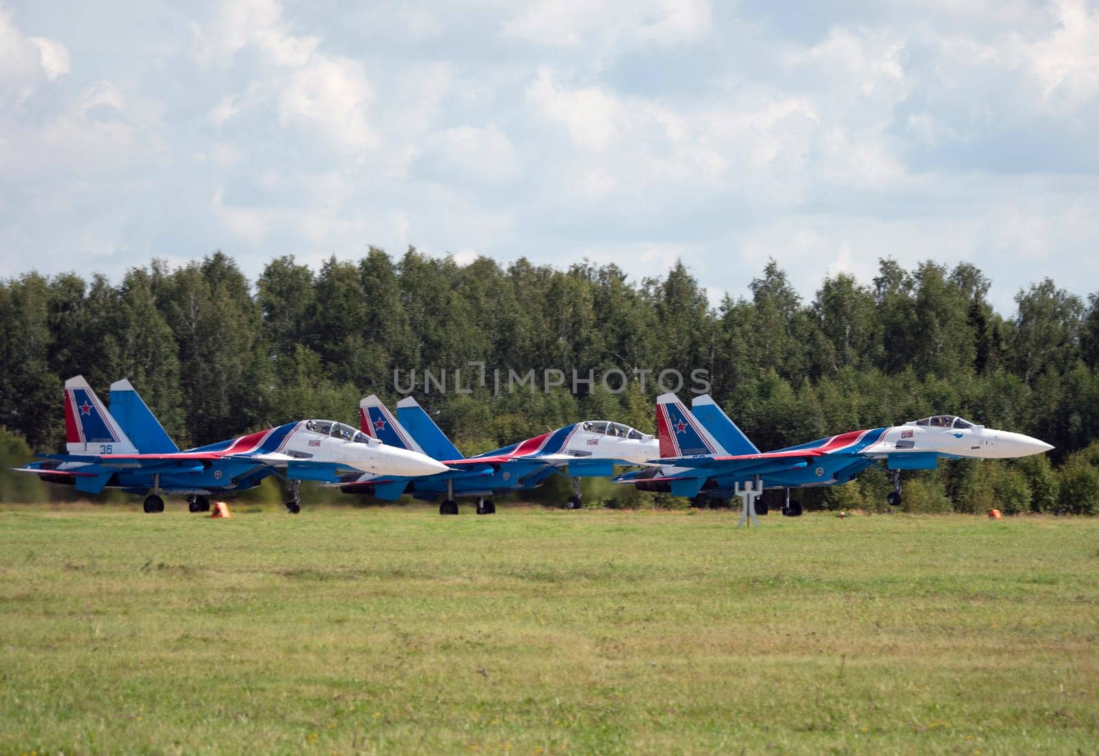 Moscow Russia Zhukovsky Airfield 31 August 2019: The Russian Knights Russkie Vityazi aerobatic team performs a demonstration flight with aerobatics figures of the international aerospace salon MAKS-2019.