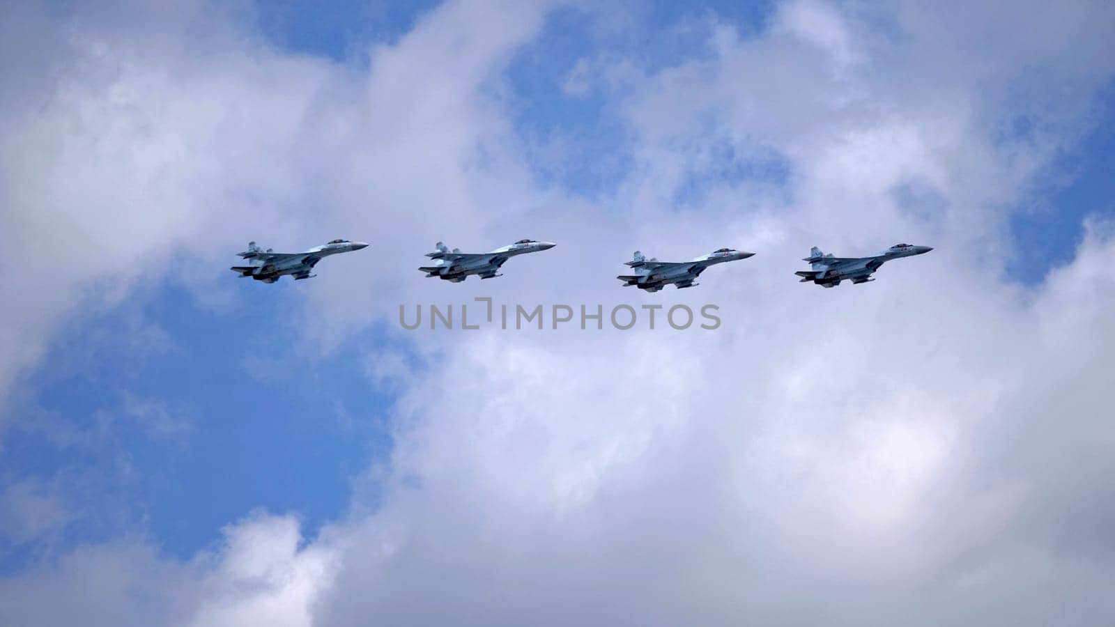 MOSCOW, RUSSIA - MAY 7, 2021: Avia parade in Moscow. jet fighter aircraft Su-35 in the sky on parade of Victory in World War II in Moscow, Russia