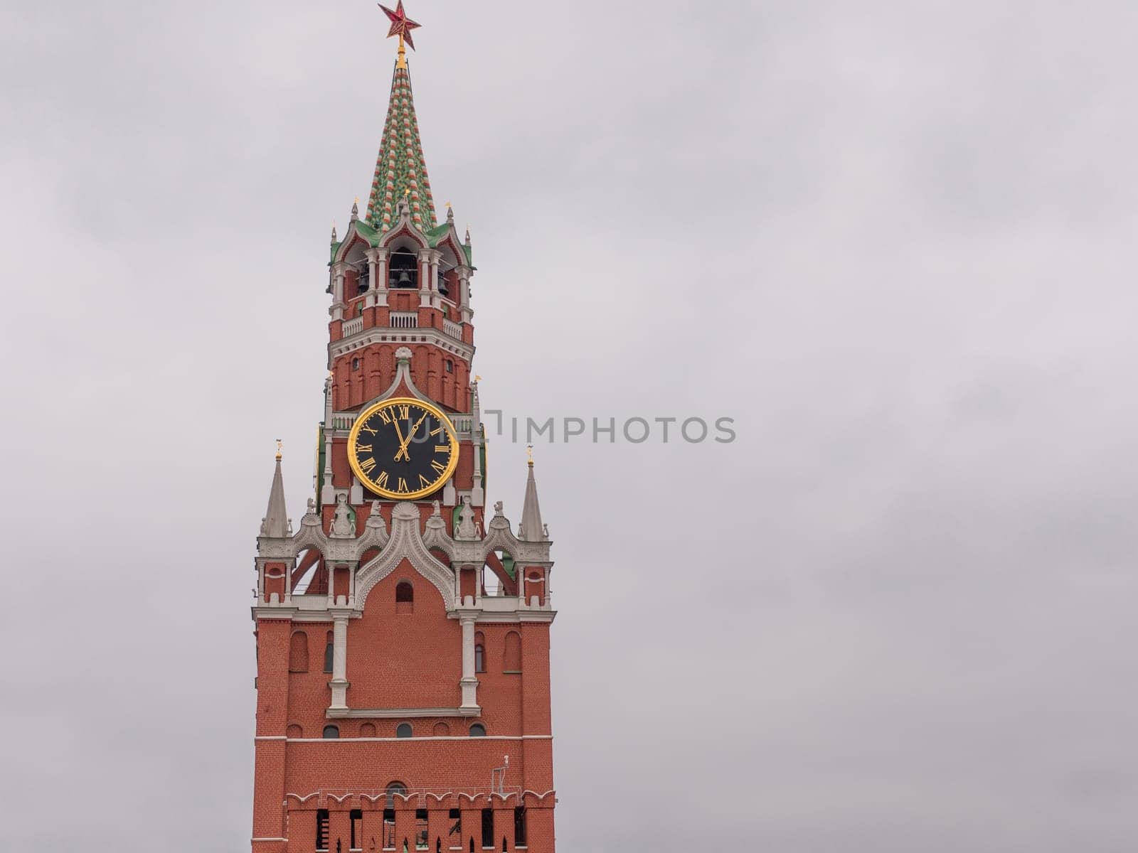Moscow Kremlin Main Clock named Kuranti on Spasskaya Tower 12 hours . Red Square.