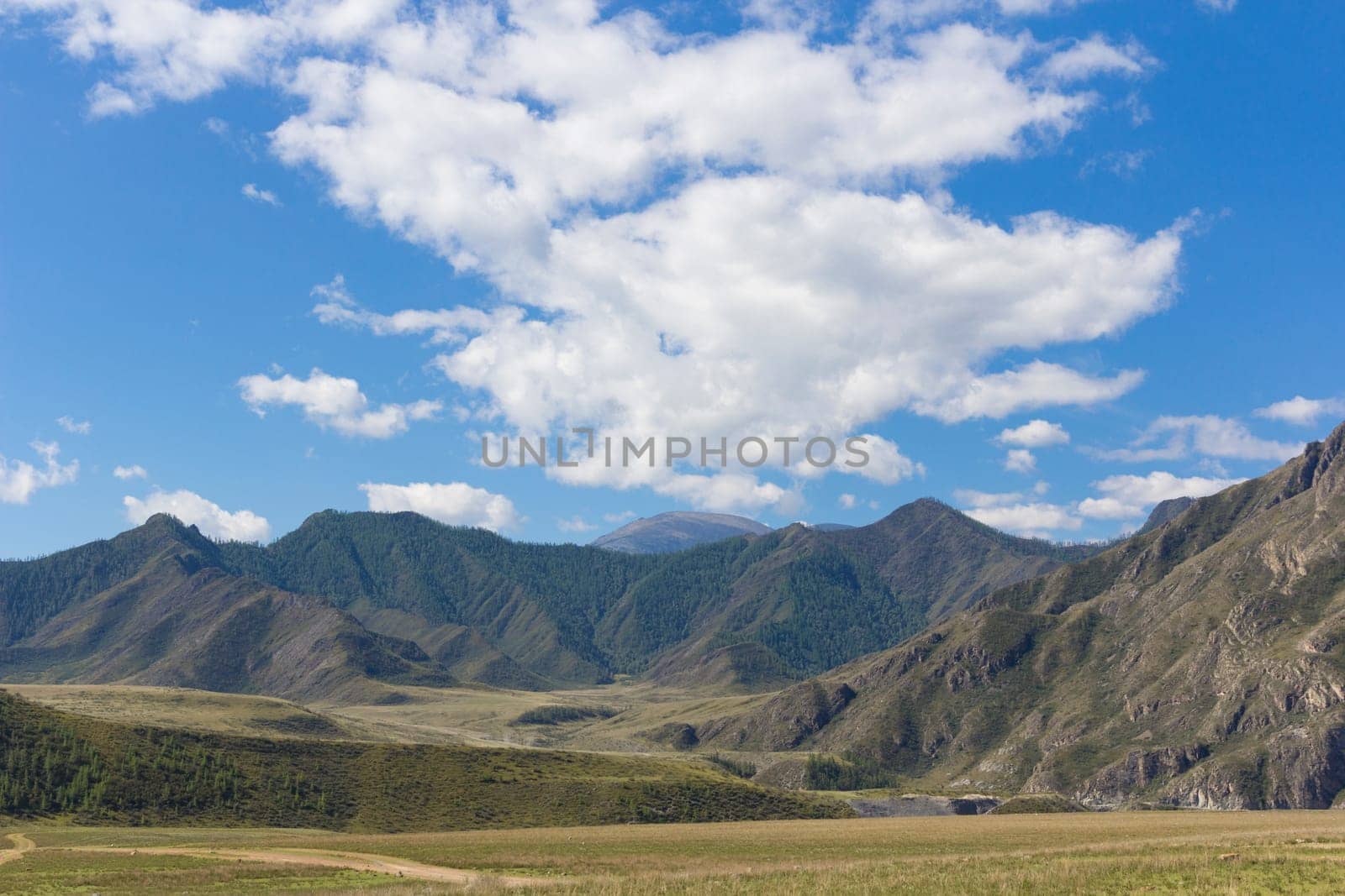 Beautiful mountain landscape with clouds in the sky.