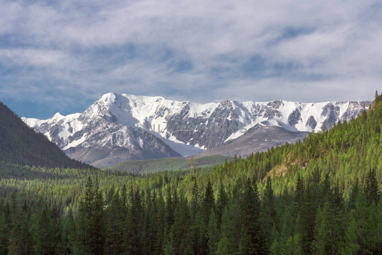 Beautiful winter landscape with snow covered mountain peaks.
