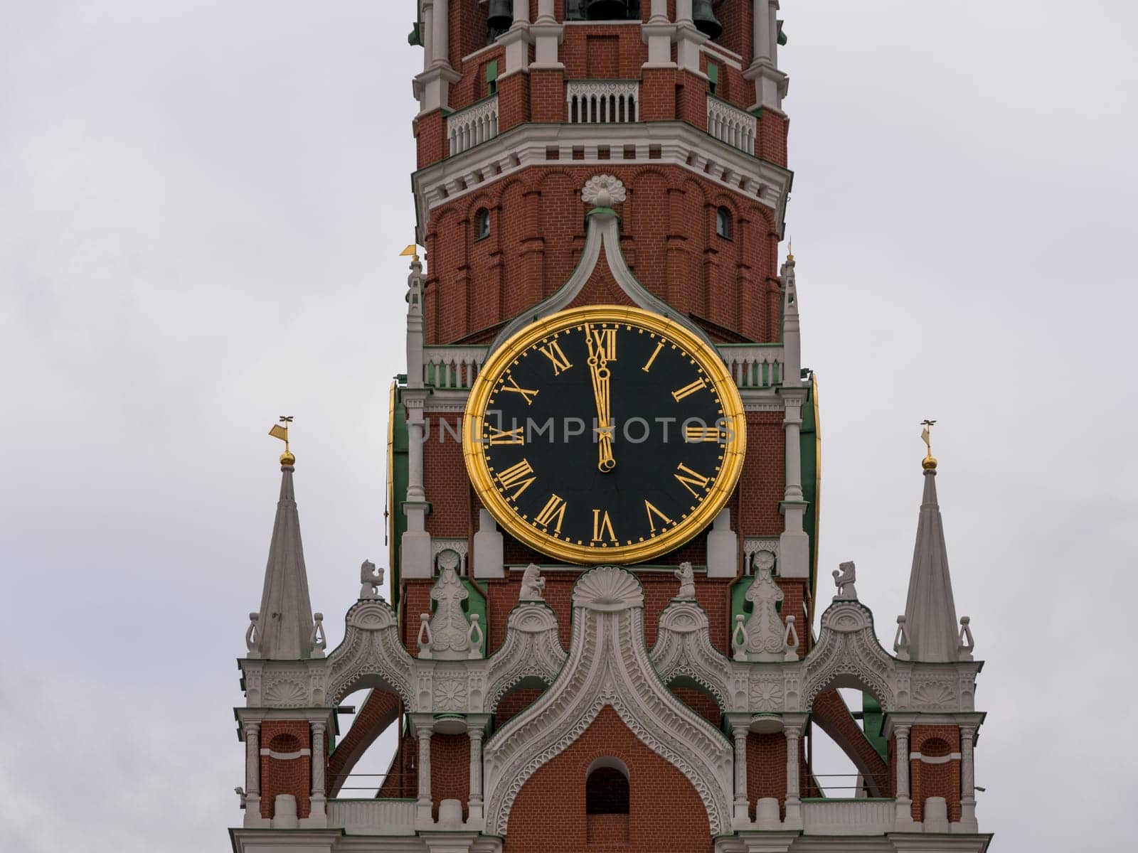 Moscow Kremlin Main Clock named Kuranti on Spasskaya Tower 12 hours . Red Square.