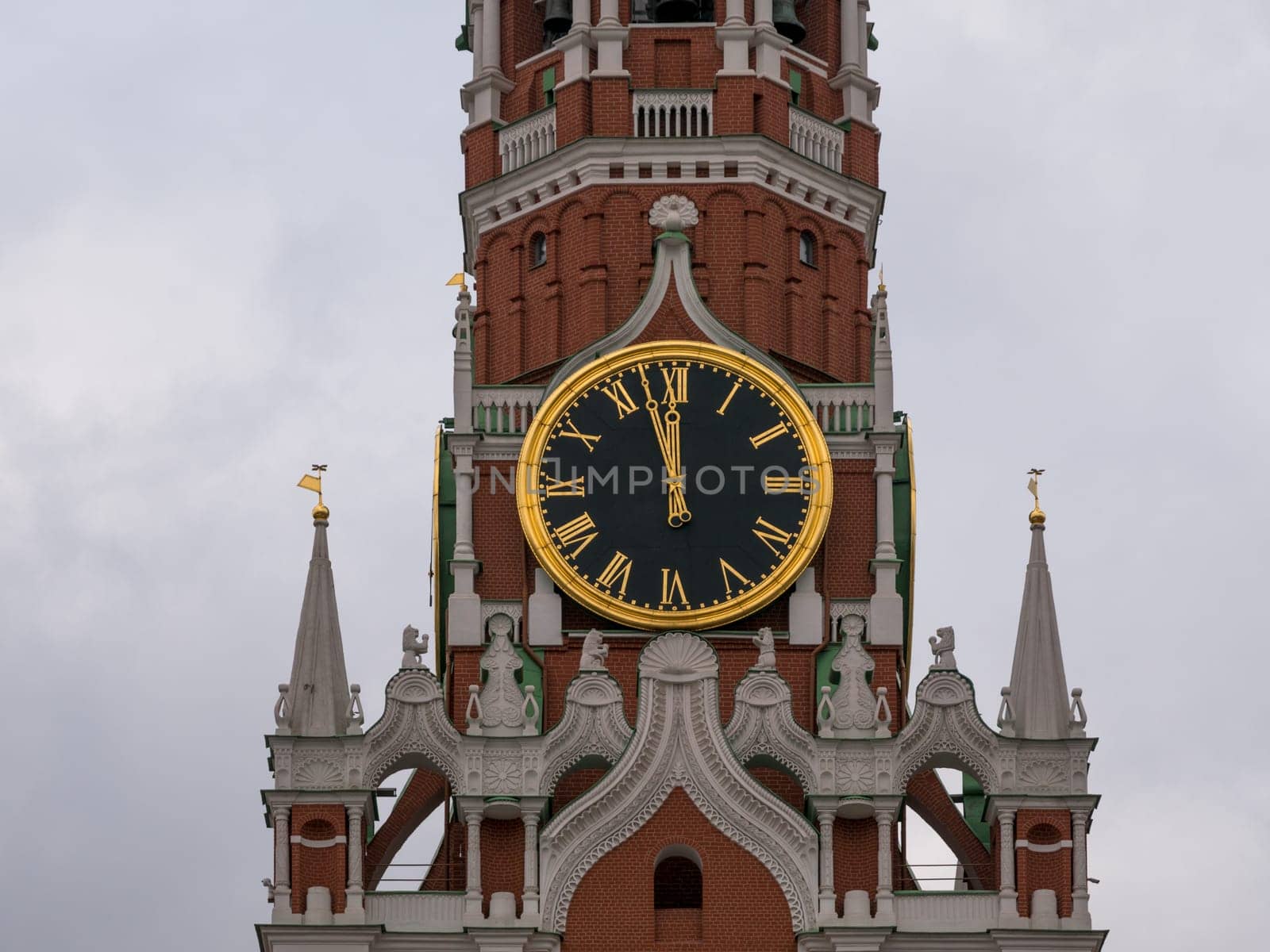 Moscow Kremlin Main Clock named Kuranti on Spasskaya Tower 12 hours . Red Square.