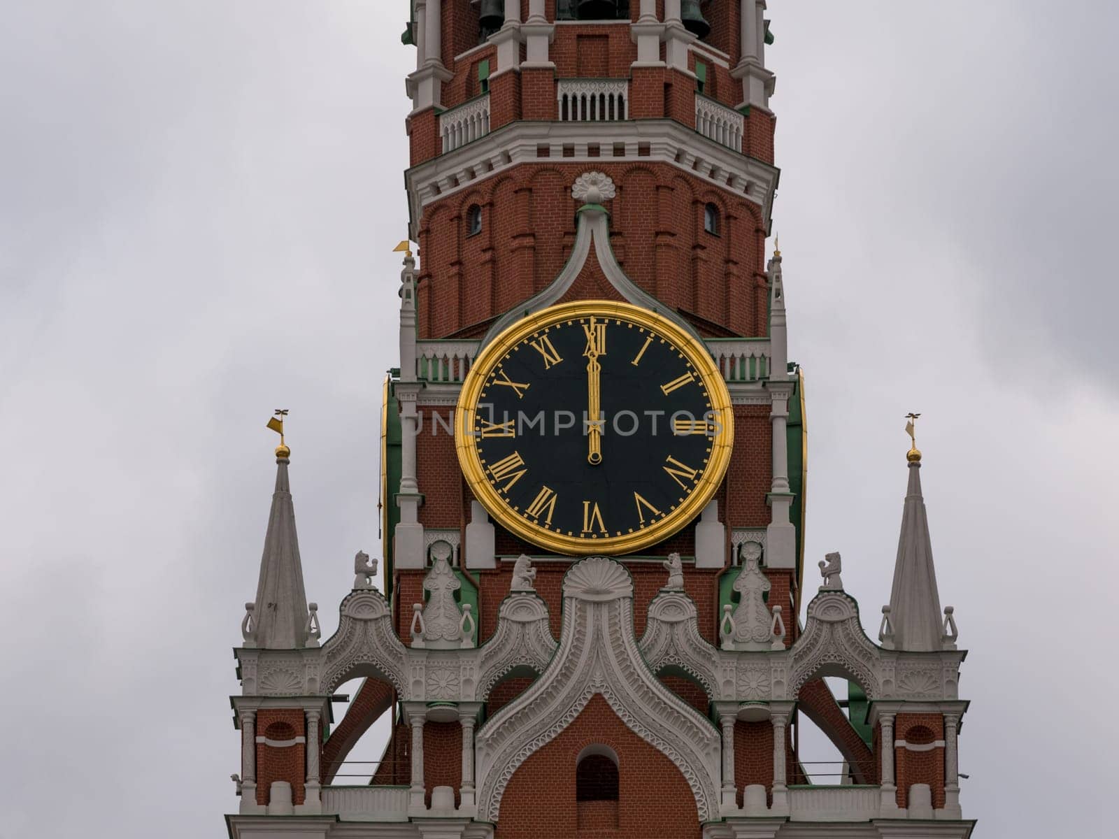Moscow Kremlin Main Clock named Kuranti on Spasskaya Tower 12 hours . Red Square.