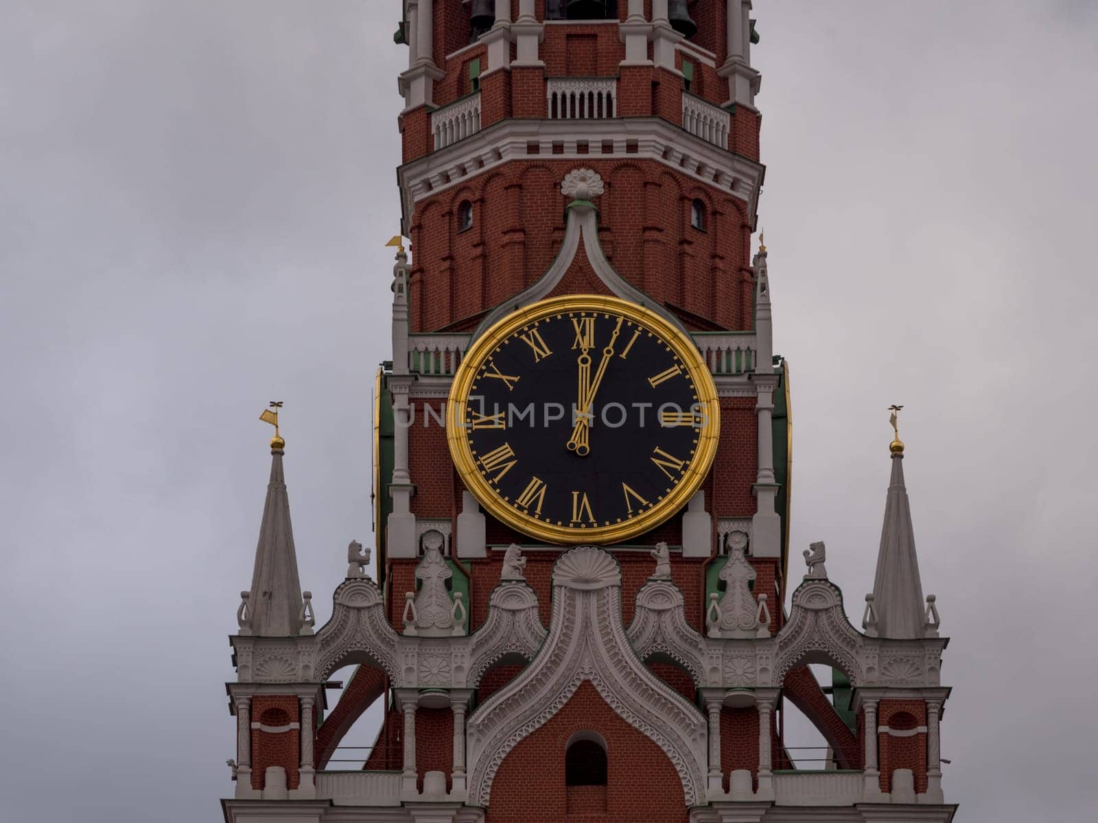 Moscow Kremlin Main Clock named Kuranti on Spasskaya Tower 12 hours . Red Square.