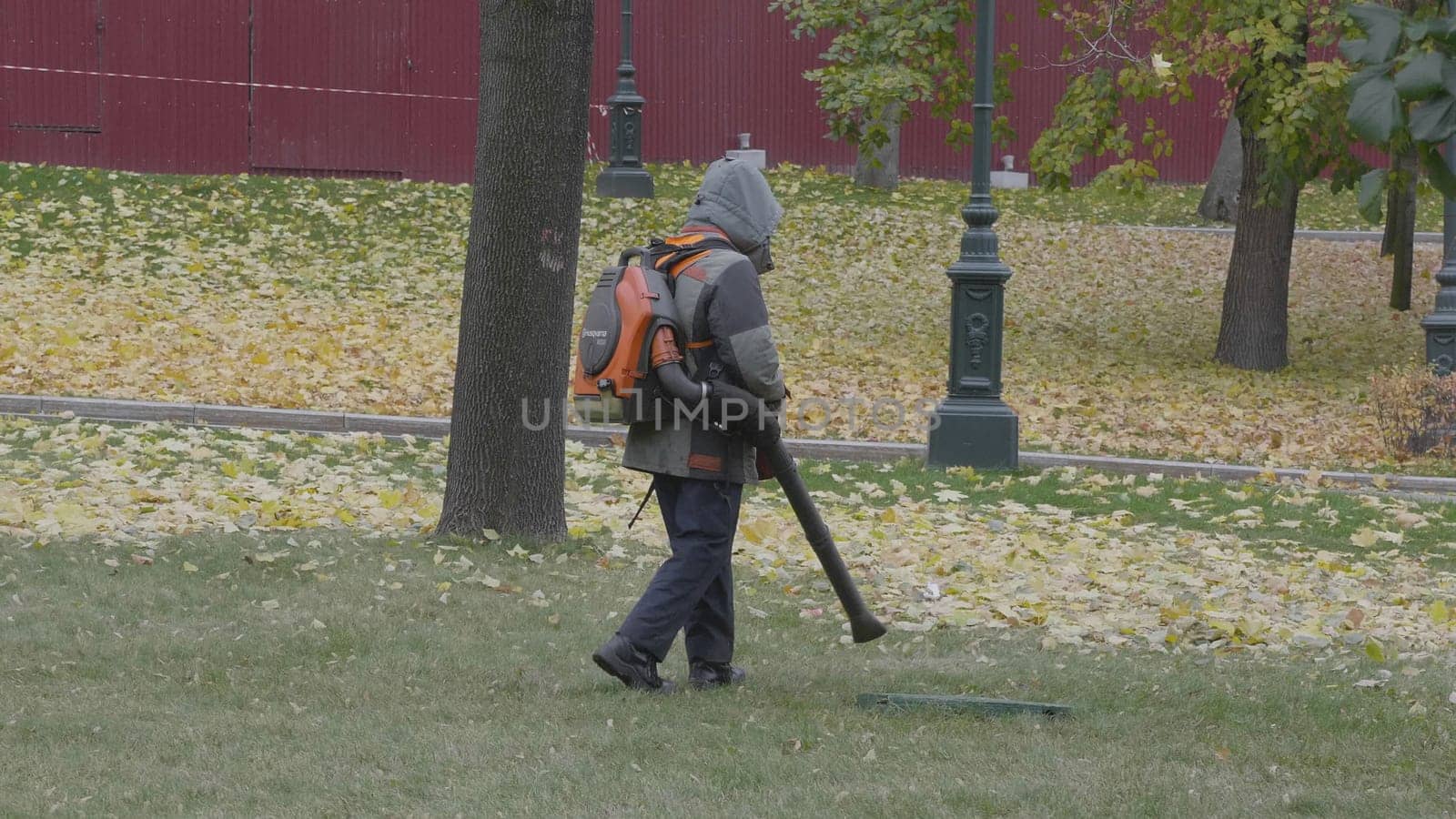 Working blows autumn leaves vacuum blower.