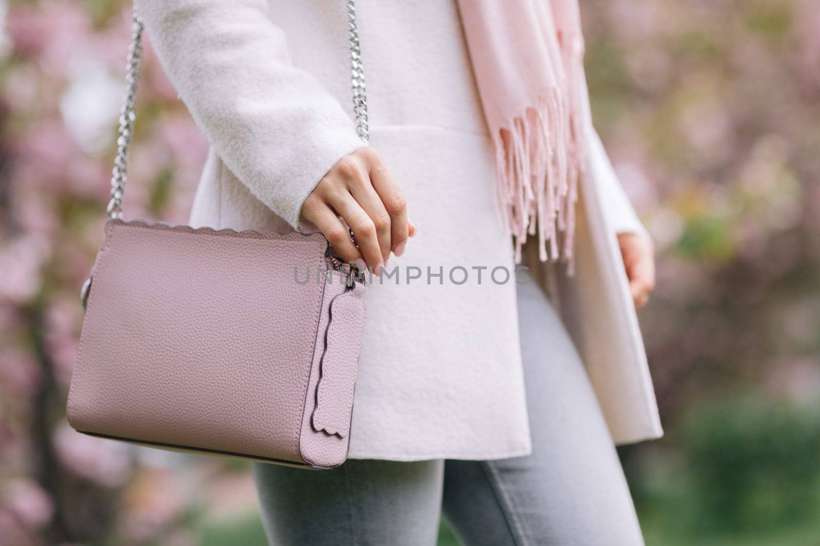 woman in white coat, scarf and pink handbag by erstudio