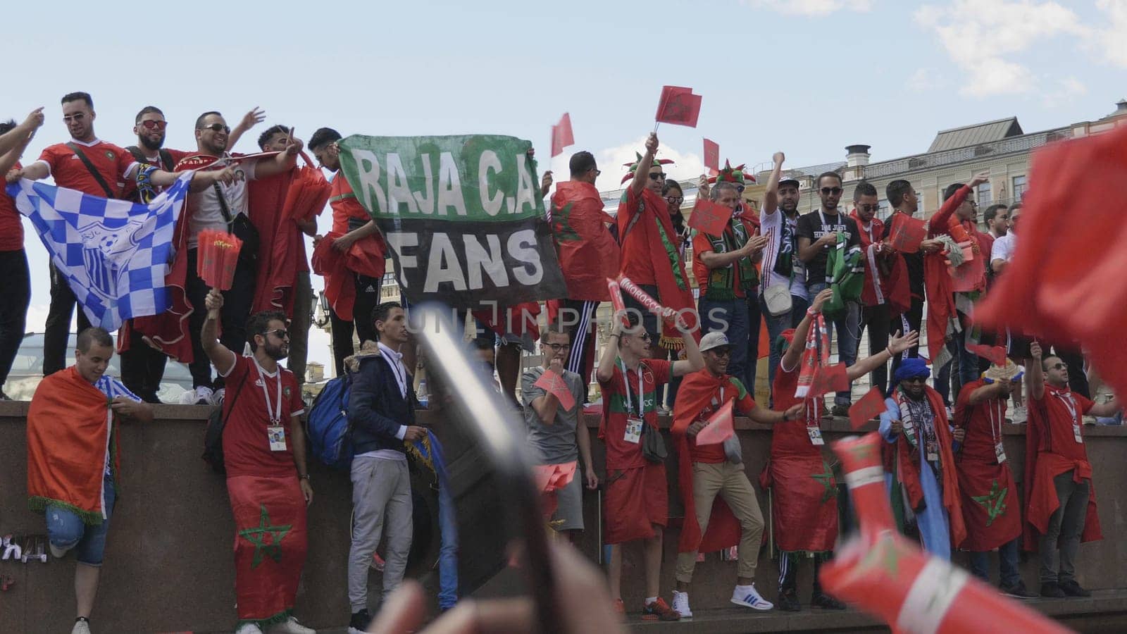 MOSCOW - JUNE 20, 2018: Soccer World Cup Fanatics of Morocco with flags with their typical costumes in the streets June 20, 2018 in Moscow, Russia.