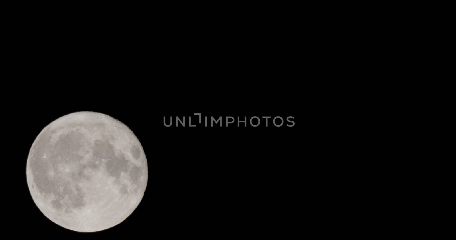 Full moon on halloween day being Earth's only permanent natural satellite.