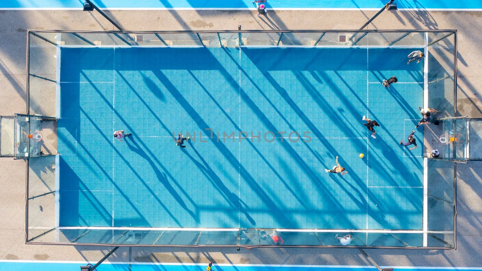 Aerial view of the city public basketball and football court. by andreonegin