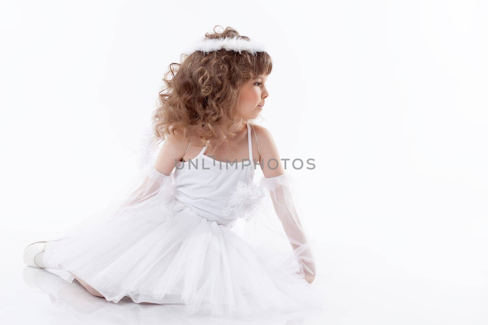 Adorable little angel isolated on white background