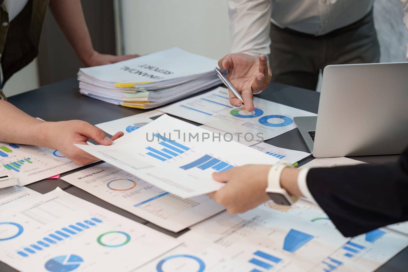 Group of Business people or Accountant checking finance data document for investigation of corruption account at meeting room. Anti Bribery concept.