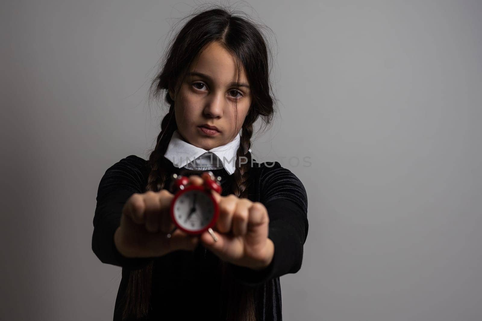 Wednesday student girl on a dark background